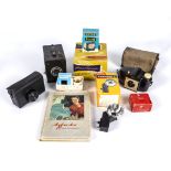 A selection of vintage photographic equipment including a Conway 6 x 9 cm film camera, Kodak Brownie