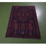 An Old Baluchi rug Size 130cm x 86cm