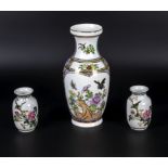 A Chinese vase and two small ones