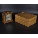 A sycamore box and a small clock