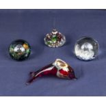 Four Selkirk glass paperweights