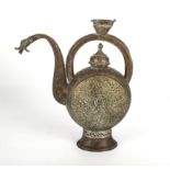 Middle Eastern antique ewer moon flask shaped, finely embossed to the body with intricate brass