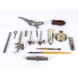 A collection of assorted items including, nut cracker, penknives, wine taps, stop watch and other