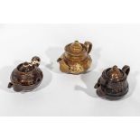 Three small brown pottery teapots