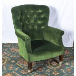 A Victorian button back arm chair.