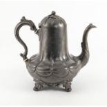 A pewter coffee pot