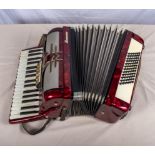 A Sorrento accordion with case