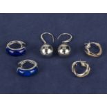 Three pairs of silver earrings