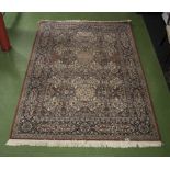 A blue and red ground wool rug, 170cm x 240cm