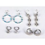 Four pairs of silver earrings, hoops and droppers
