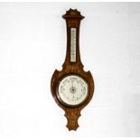 An Edwardian inlaid mahogany aneroid barometer