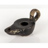 Roman antique blackware oil lamp of typical form circa 200-300 BC length 5" width 2.5â€