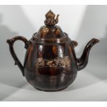 A very large Rockingham brown glazed teapot, 43cm tall