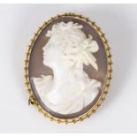 Fine quality Victorian cameo brooch carved with a classical maidens head, set in a 9ct gold frame.