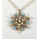 A 9ct gold chain and star shaped pendant set with turquoise and seed pearls