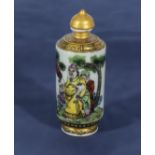 A Chinese snuff bottle decorated with figures