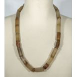 Antique agate/carnelian tube shaped beads necklace of fine quality and colour, with 2 faceted master