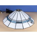 An Art Deco style panelled glass ceiling light shade