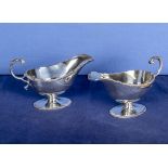 A pair of good quality silver Georgian style sauce boats, 317gms