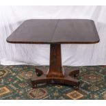 An early Victorian tea table in mahogany with inlays.