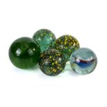 Five extra large glass marbles