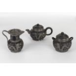 Chinese pewter dragon mounted black pottery three piece teased circa 1920/30s stamped Wen Hua Shun