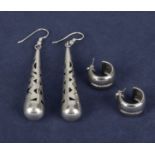 A pair of silver dropper earrings and one other