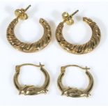 A pair of 9ct gold hoop earrings together with a pair with dolphins