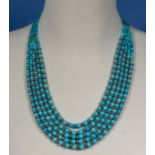A five string Indian turquoise and silver graduated bead necklace