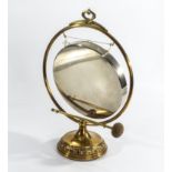 A brass dinner gong, 43cm tall