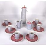 A retro pink and grey coffee set