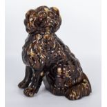 A large Rockingham brown glazed dog, 29cm tall