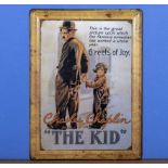 A tin advertising sign Charles Chaplin The Kid