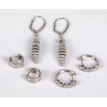 Three pairs of silver earrings