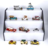 A collection of Corgi diecast models including Chitty Chitty Bang Bang, Monkeemobile and a Commer