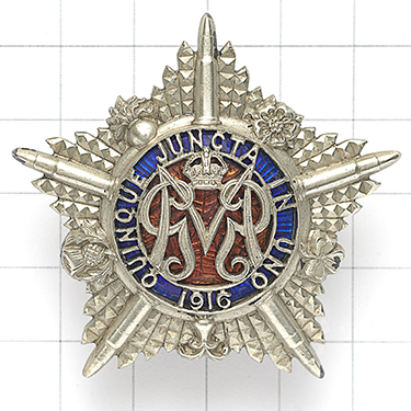 Machine Gun Guards WW1 Officer’s 1916 Birmingham hallmarked silver and enamel cap star. Fine