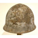 WW2 Imperial Japanese Combat Helmet.This example retaining original three pad green material