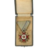 Bulgaria. Order of Bravery, 4th Class with swords cased breast badge circa 1915-18.A fine red and