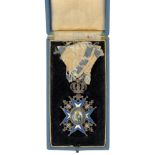 Serbia. Order of the St. Sava 5th Class, cased breast badge.A fine example in silver-gilt and