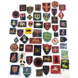 54 British Army cloth formation signs.