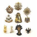 10 assorted Officer’s full dress cap badges.