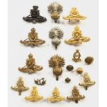 15 assorted Artillery head-dress badges.