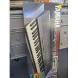 A Yamaha PSR-19 Portatone electronic piano keyboard in original box