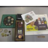 A 1999 five-pound coin, a 1933 George V coin collection, and others to include two coin covers.