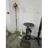 A late Victorian copper and lacquered brass, floor standing oil lamp converted to electricity, a