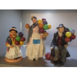 Three Royal Doulton figures to include Biddy Penny Farthing HN1843, The Balloon Man HN1954 and