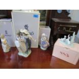 Three Lladro porcelain figurines, and a Nao model of three geese, all boxed