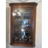 A George III mahogany and glazed corner cabinet, 42"h x 27"w