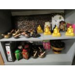 A mixed lot of Oriental items to include singing bowls, composition Buddhas, tea cannisters and