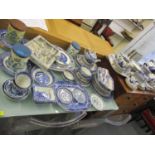 A quantity of blue and white ceramics to include Willow pattern cutlery